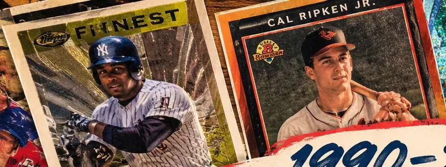 Close-up of ChatGPT's image: a Yankees card labeled 'FHNEST' with a smeared imitation logo, next to a 'Cal Ripken Jr.' card with a garbled Bowman-style logo.